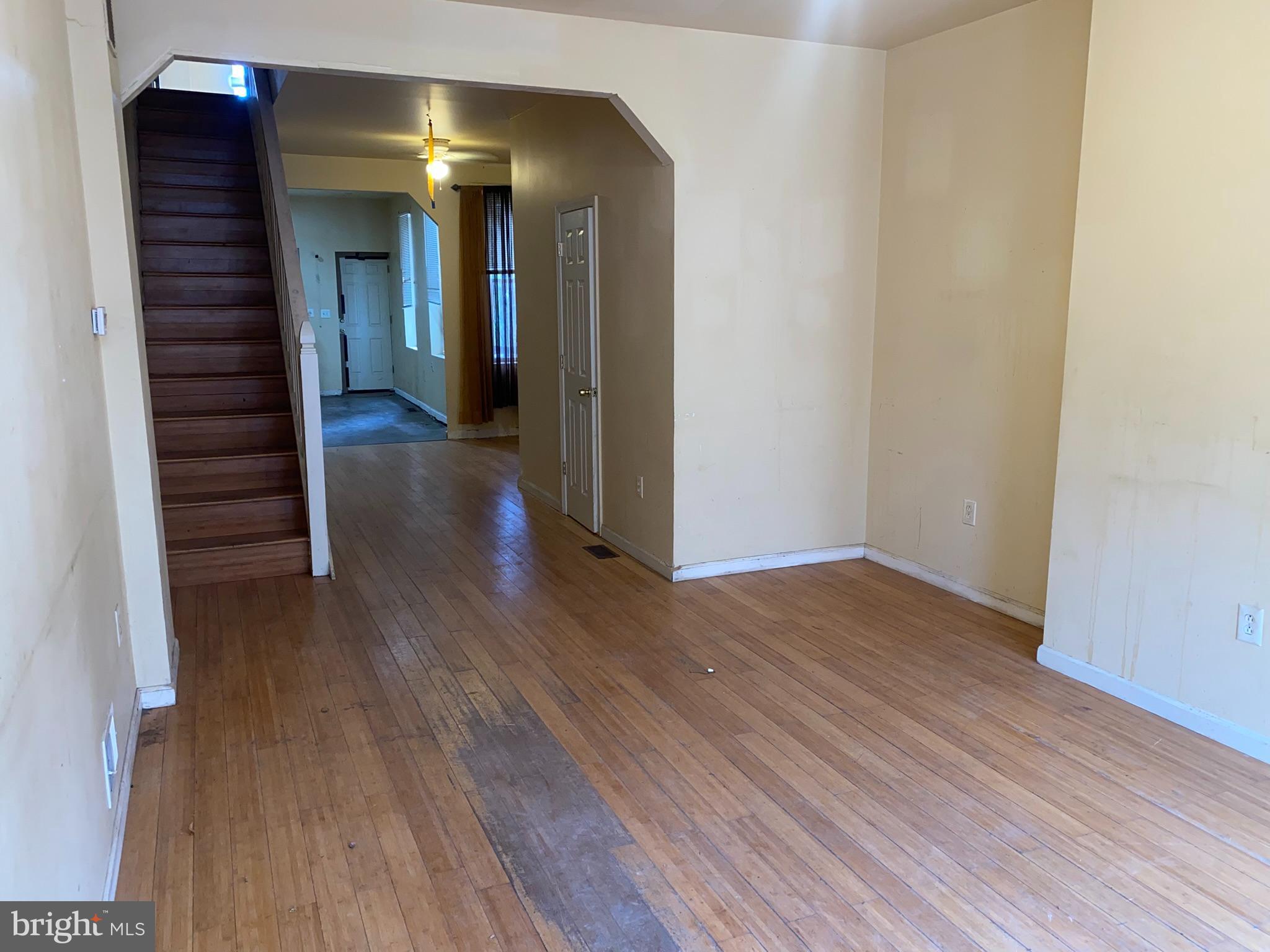 2221 Jefferson Street Baltimore, MD 21205 - Photo 4 of 29 wooden floor in an empty room