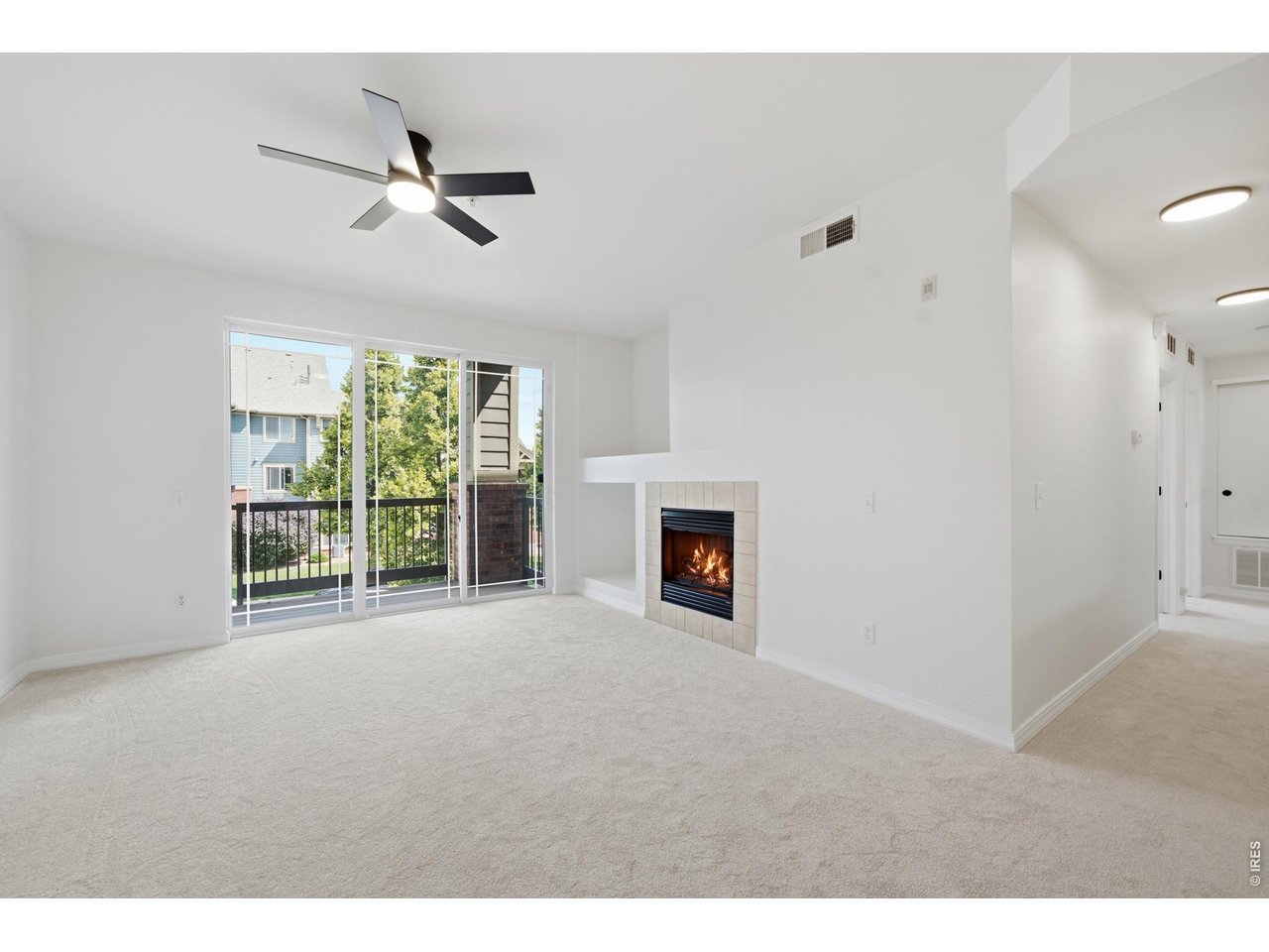 2133 Krisron Road, Unit 203 Fort Collins, CO 80525 - Photo 1 of 34 Living Room and Balcony