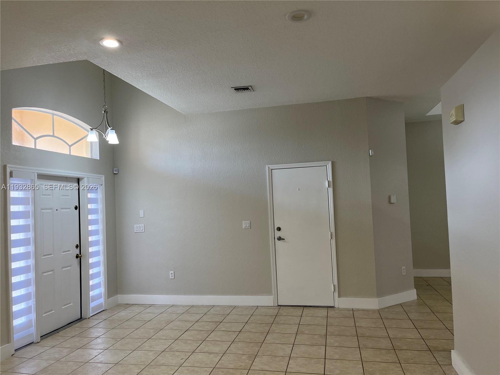 15205 Southwest 13th Terrace Miami, FL 33194 - Photo 5 of 12 a view of an empty room