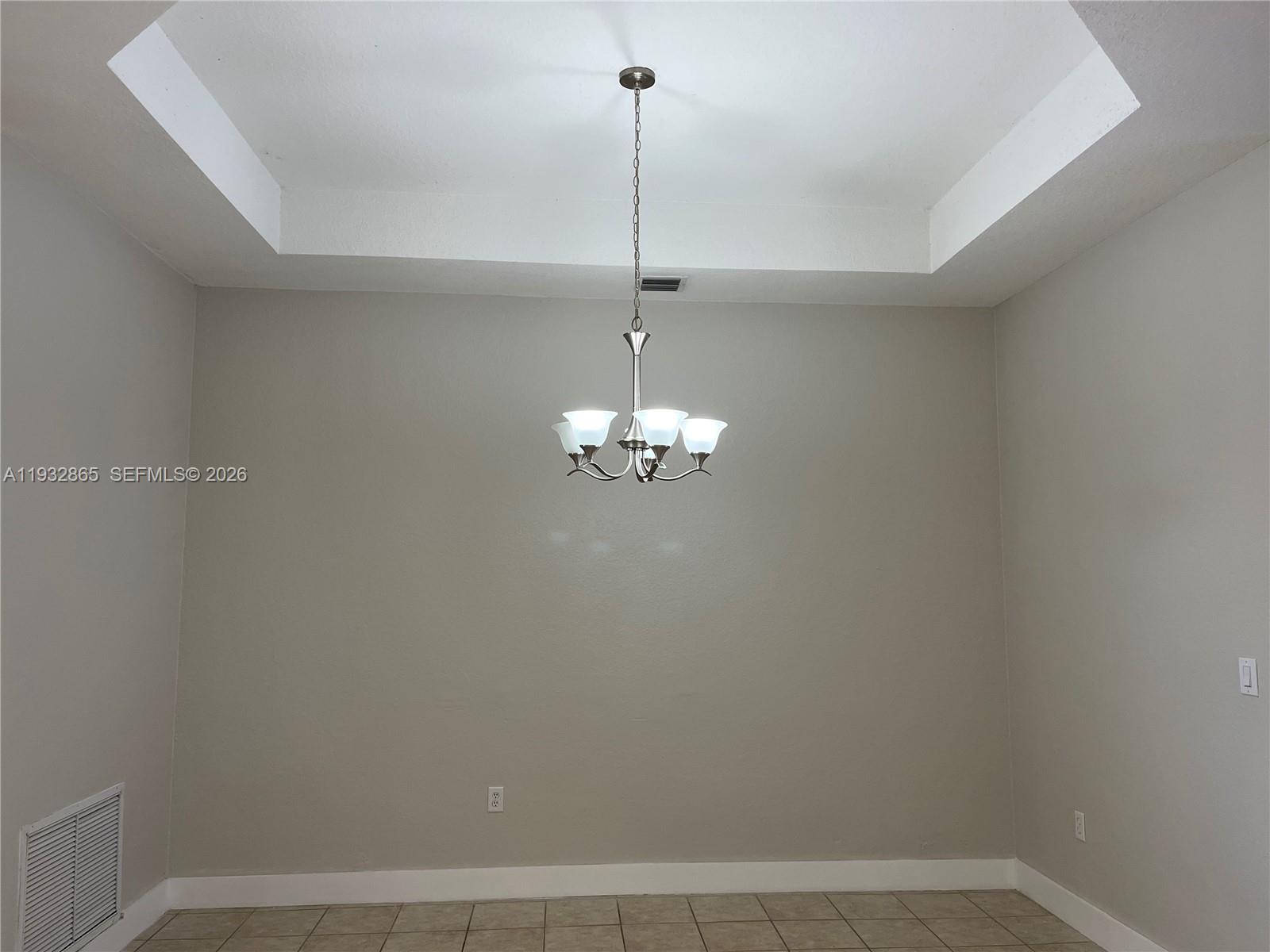 15205 Southwest 13th Terrace Miami, FL 33194 - Photo 6 of 12 a view of a chandelier in a room