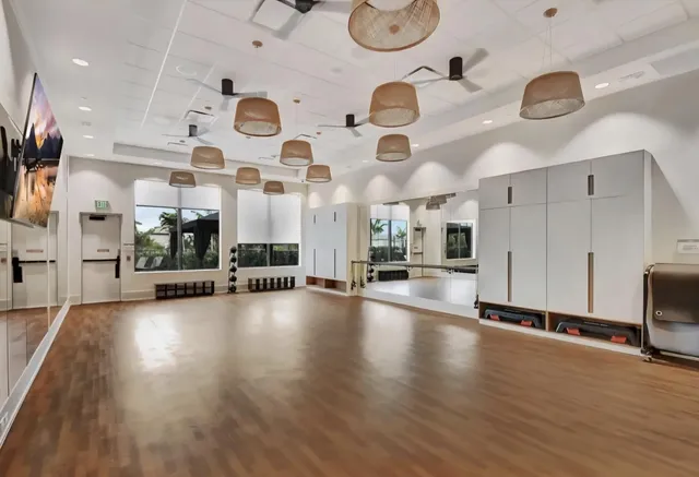 a view of a dining room kitchen and hall with furniture