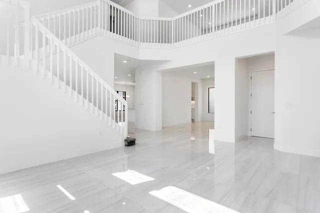 a view of staircase with white walls and white walls