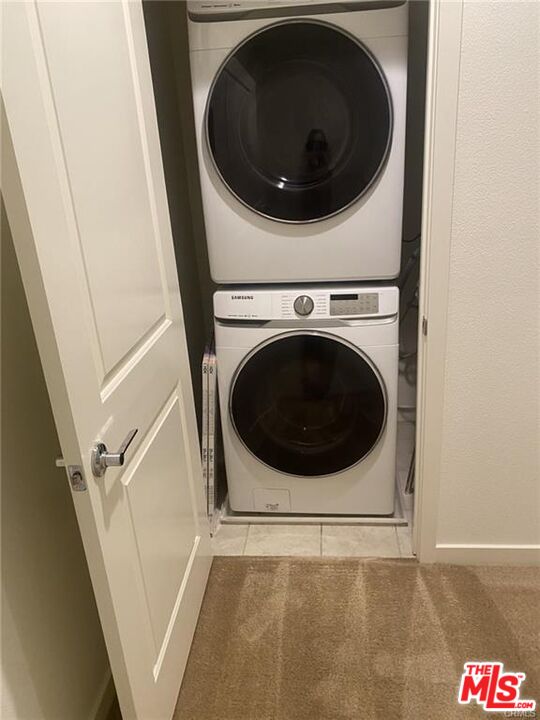 302 Limestone Lake Forest, CA 92610 - Photo 14 of 34 a utility room with dryer and washer