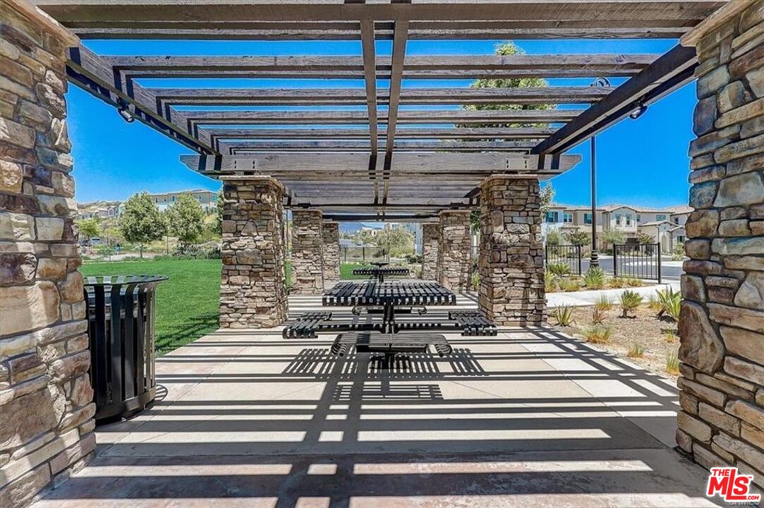 302 Limestone Lake Forest, CA 92610 - Photo 15 of 34 a view of a patio with a fountain