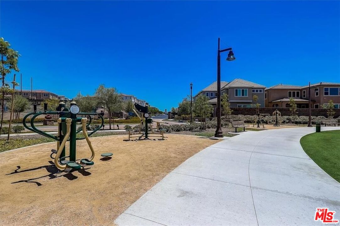 302 Limestone Lake Forest, CA 92610 - Photo 21 of 34 a view of a gym with equipment