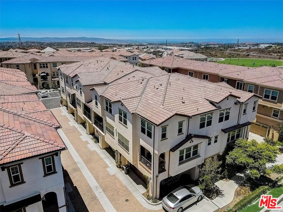 302 Limestone Lake Forest, CA 92610 - Photo 29 of 34 an aerial view of a house with a ocean view