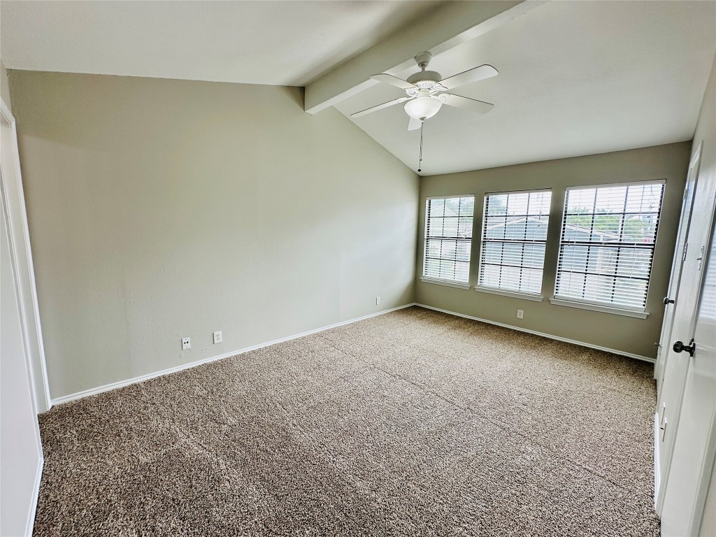 2215 Post Road, Unit 2028 Austin, TX 78704 - Photo 11 of 25 wooden floor in an empty room with a window