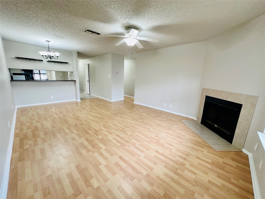 2215 Post Road, Unit 2028 Austin, TX 78704 - Photo 9 of 25 a view of a livingroom with a kitchen and a dishwasher