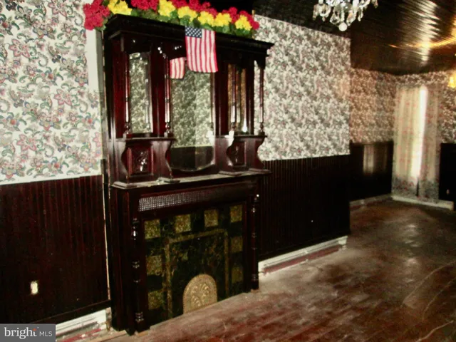 a living room with large mirror