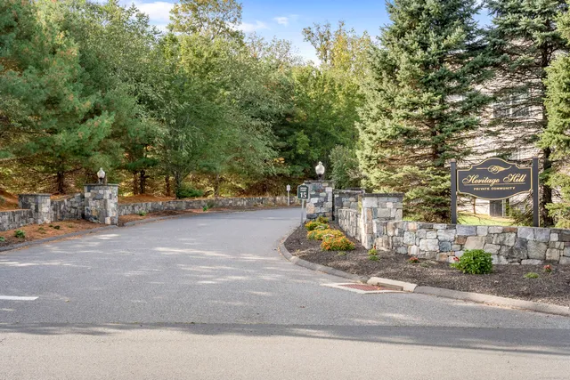 a view of a street with houses