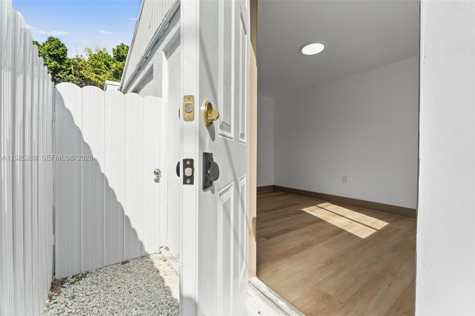 1453 Northwest 56th Street Miami, FL 33142 - Photo 14 of 29 a view of entryway and hall