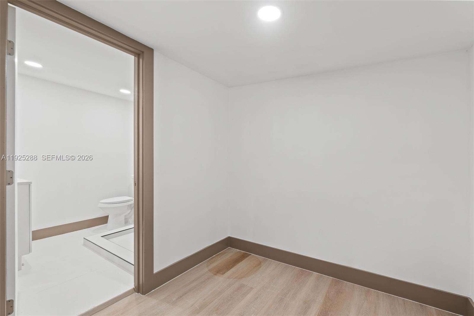 1453 Northwest 56th Street Miami, FL 33142 - Photo 18 of 29 a view of empty room