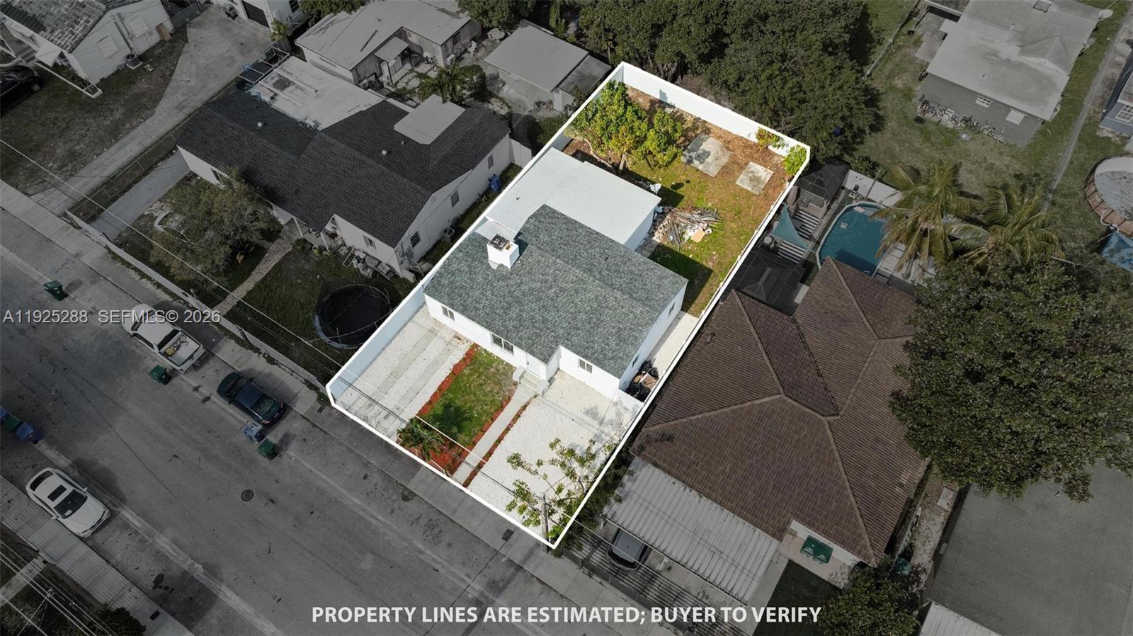 1453 Northwest 56th Street Miami, FL 33142 - Photo 23 of 29 an aerial view of a house