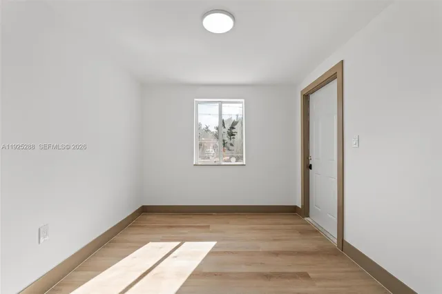 an empty room with windows