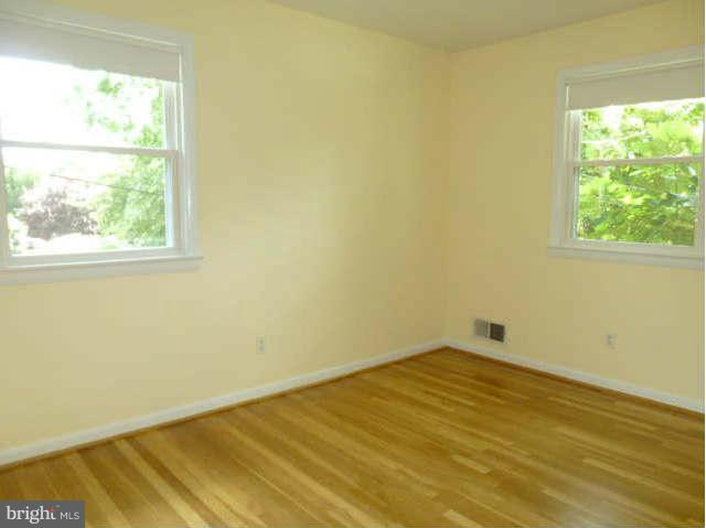 2225 Forest Glen Road Silver Spring, MD 20910 - Photo 13 of 30 an empty room with a window