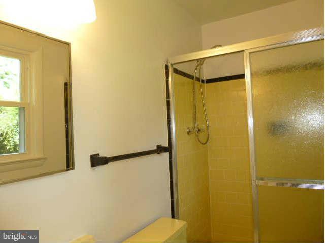 2225 Forest Glen Road Silver Spring, MD 20910 - Photo 17 of 30 a bathroom with a shower and a toilet