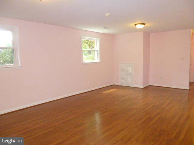 2225 Forest Glen Road Silver Spring, MD 20910 - Photo 20 of 30 an empty room with a empty space and a window