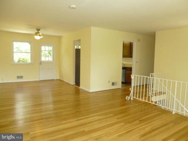 2225 Forest Glen Road Silver Spring, MD 20910 - Photo 3 of 30 a view of an empty room with glass door