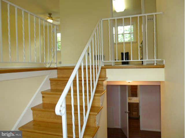 2225 Forest Glen Road Silver Spring, MD 20910 - Photo 23 of 30 a view of a kitchen with wooden floor and staircase