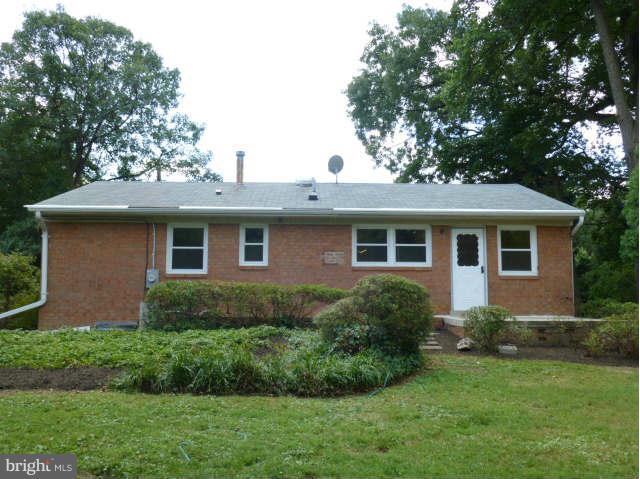 2225 Forest Glen Road Silver Spring, MD 20910 - Photo 28 of 30 a view of a house with a yard plants and large tree