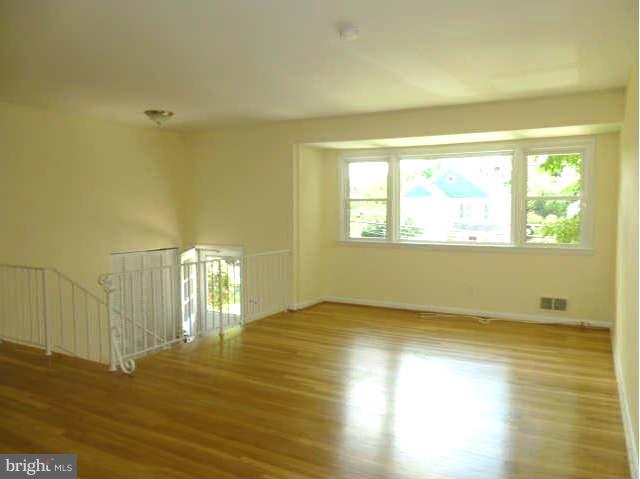 2225 Forest Glen Road Silver Spring, MD 20910 - Photo 5 of 30 a view of an empty room and window