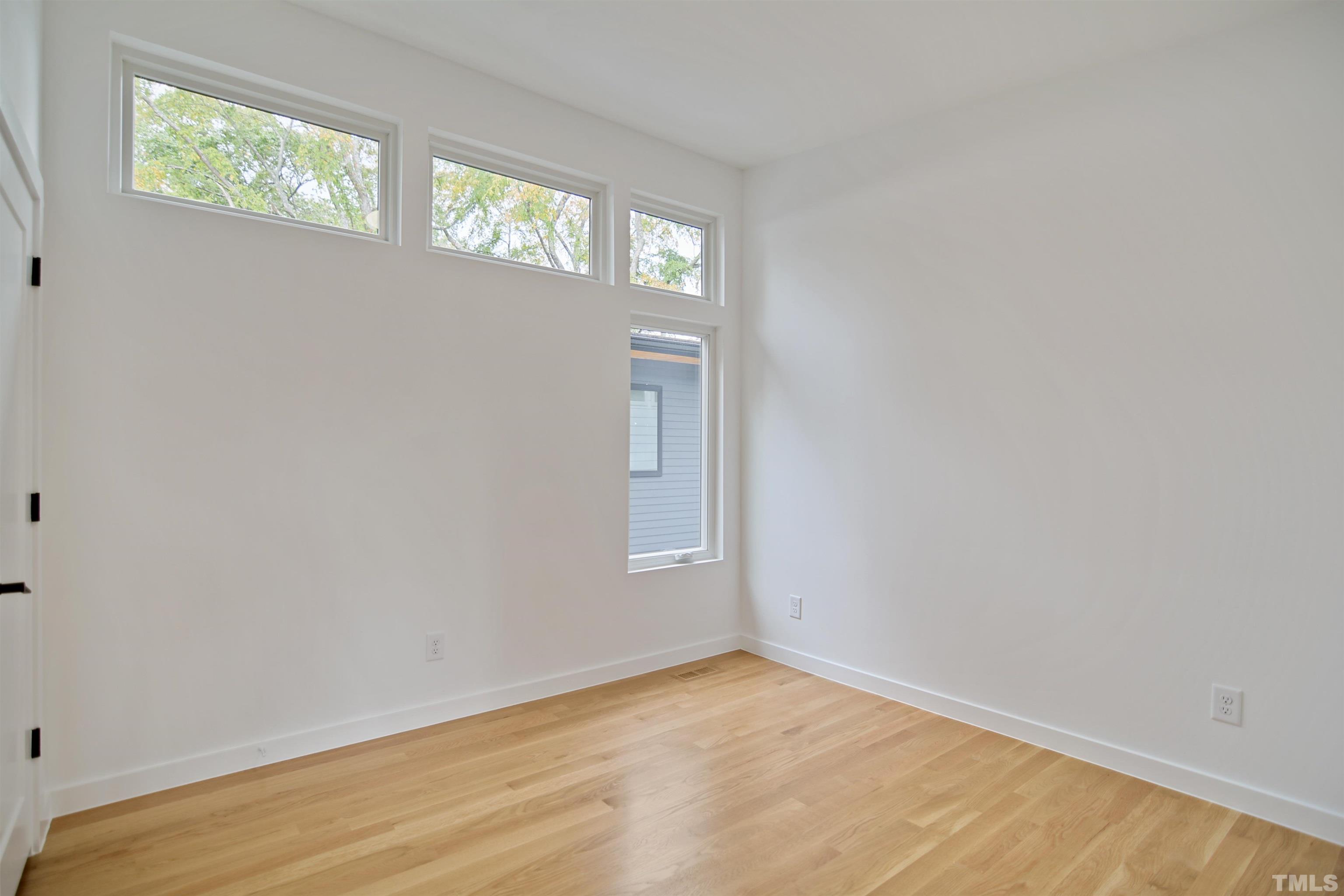 1306 East Lenoir Street Raleigh, NC 27610 - Photo 18 of 26 a view of an empty room and window