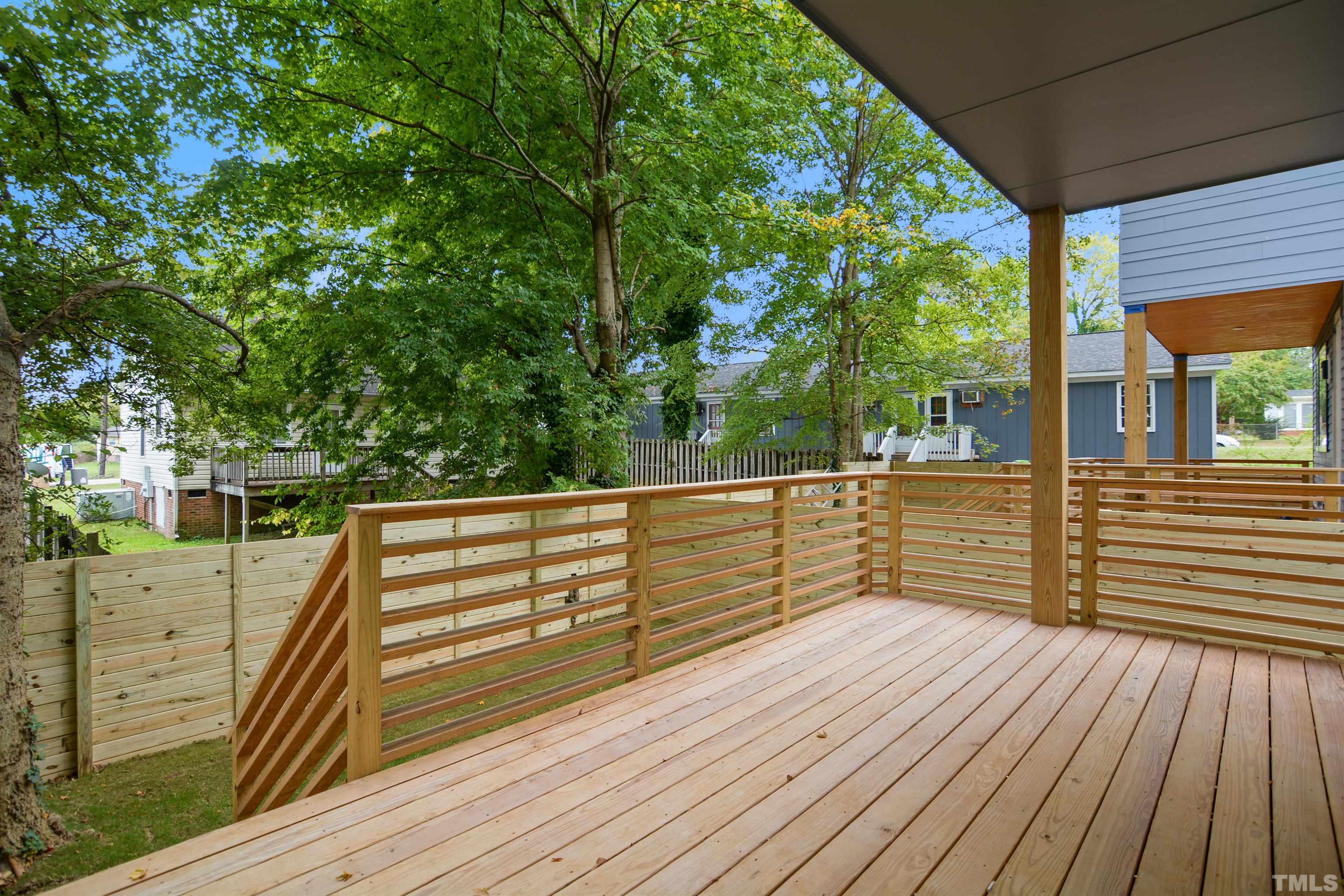 1306 East Lenoir Street Raleigh, NC 27610 - Photo 24 of 26 a view of a balcony with wooden floor
