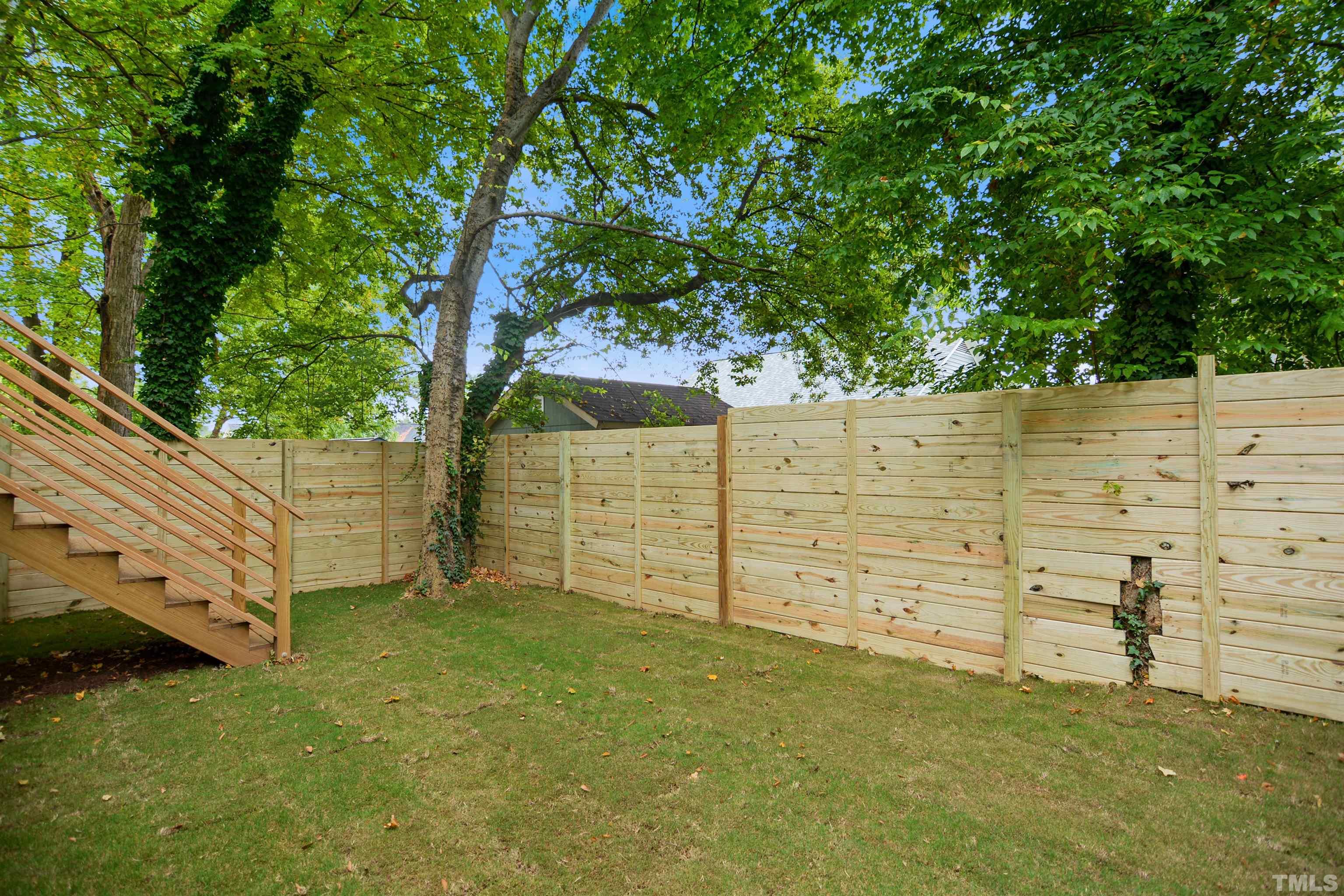 1306 East Lenoir Street Raleigh, NC 27610 - Photo 26 of 26 a view of a wooden fence