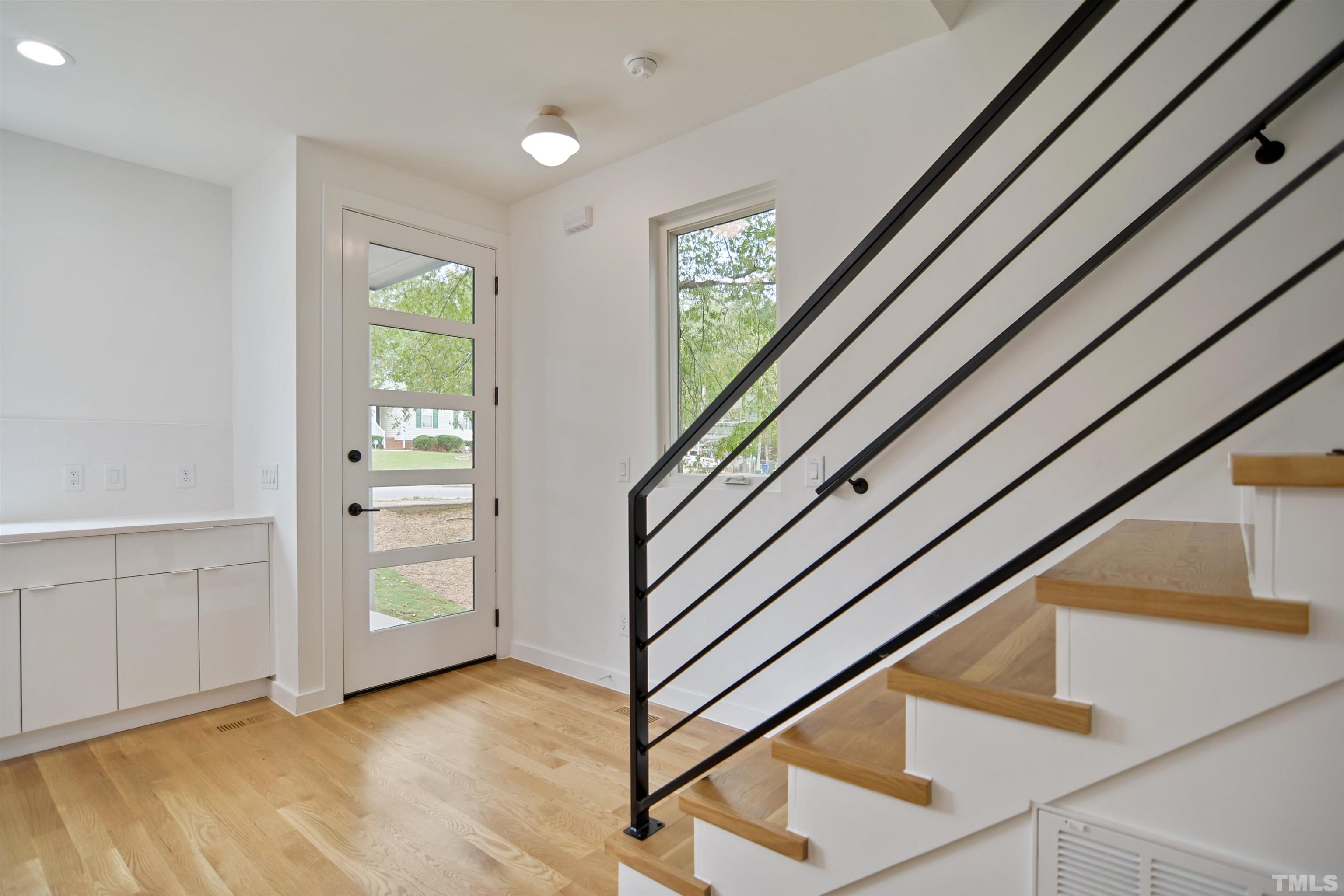 1306 East Lenoir Street Raleigh, NC 27610 - Photo 3 of 26 a view of an entryway with staircase