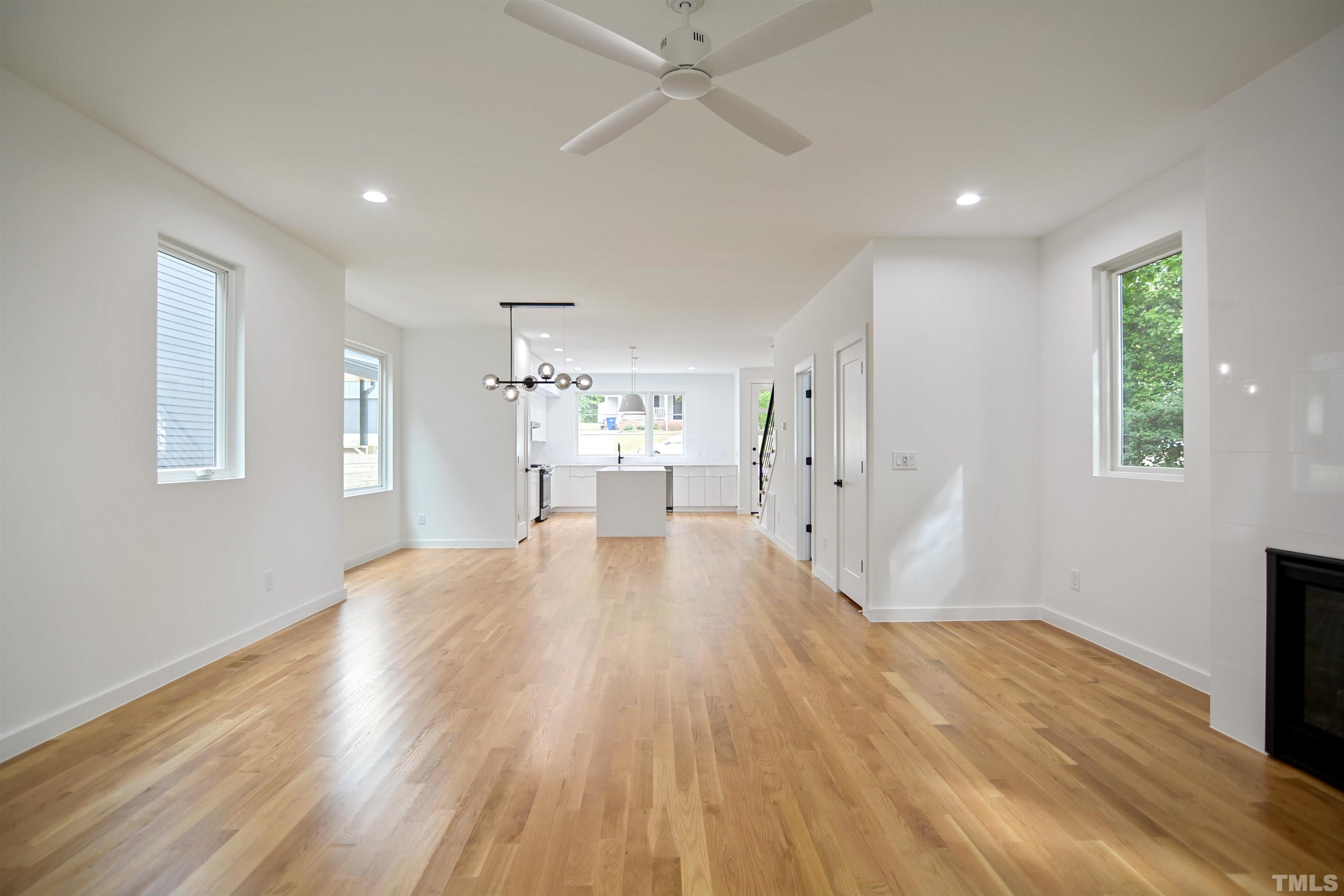 1306 East Lenoir Street Raleigh, NC 27610 - Photo 8 of 26 a view of empty room with wooden floor