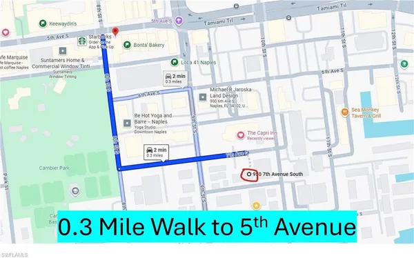 a view of kitchen with furniture and window