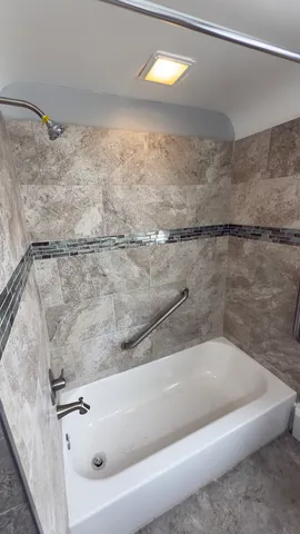 a bathroom with a bathtub