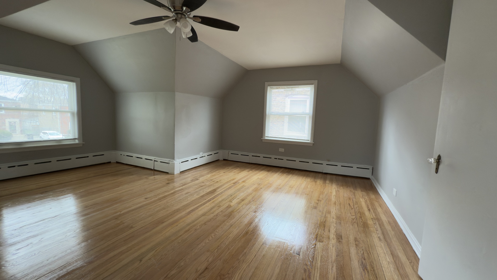 10800 South Green Street Chicago, IL 60643 - Photo 21 of 30 an empty room with wooden floor and windows