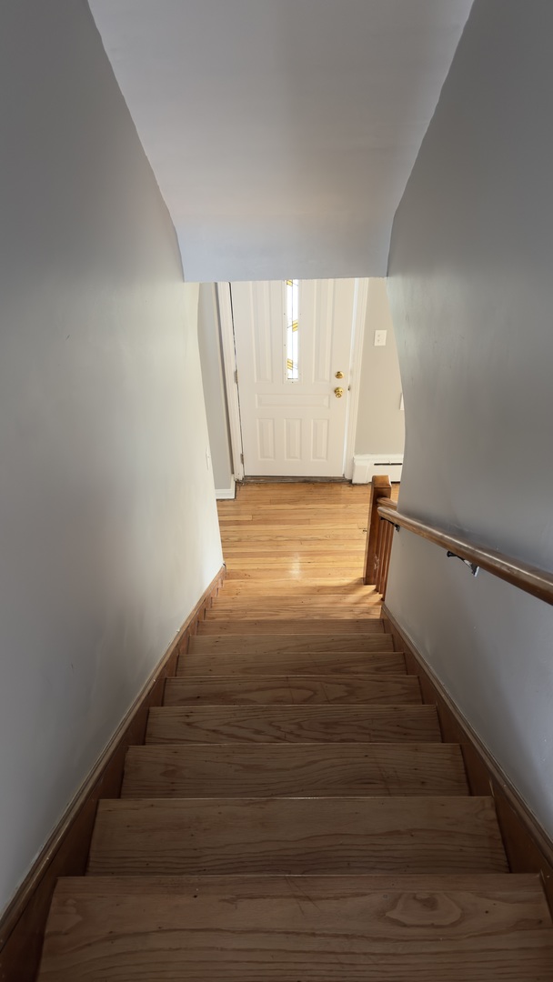 10800 South Green Street Chicago, IL 60643 - Photo 23 of 30 a view of an empty room with wooden floor