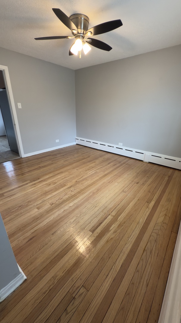 10800 South Green Street Chicago, IL 60643 - Photo 4 of 30 a view of a room with wooden floor