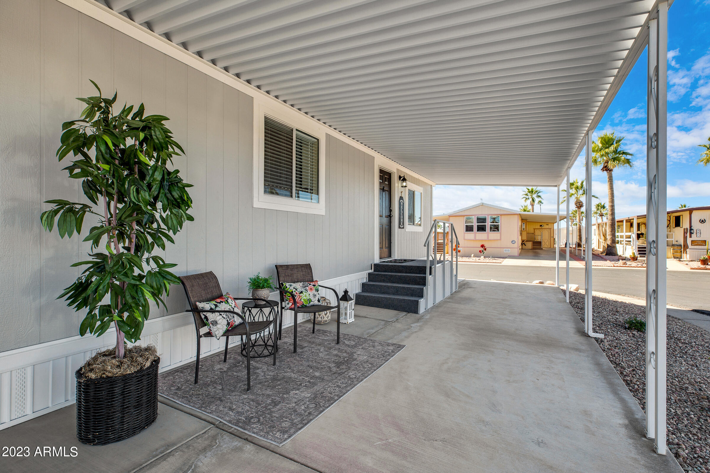 301 South Signal Butte Road, Unit 815 Apache Junction, AZ 85120 - Photo 15 of 15 a outdoor space with furniture