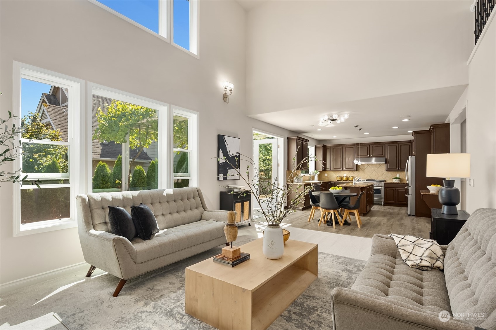 21104 39th Avenue Southeast Bothell, WA 98021 - Photo 18 of 36 a living room with furniture and a large window