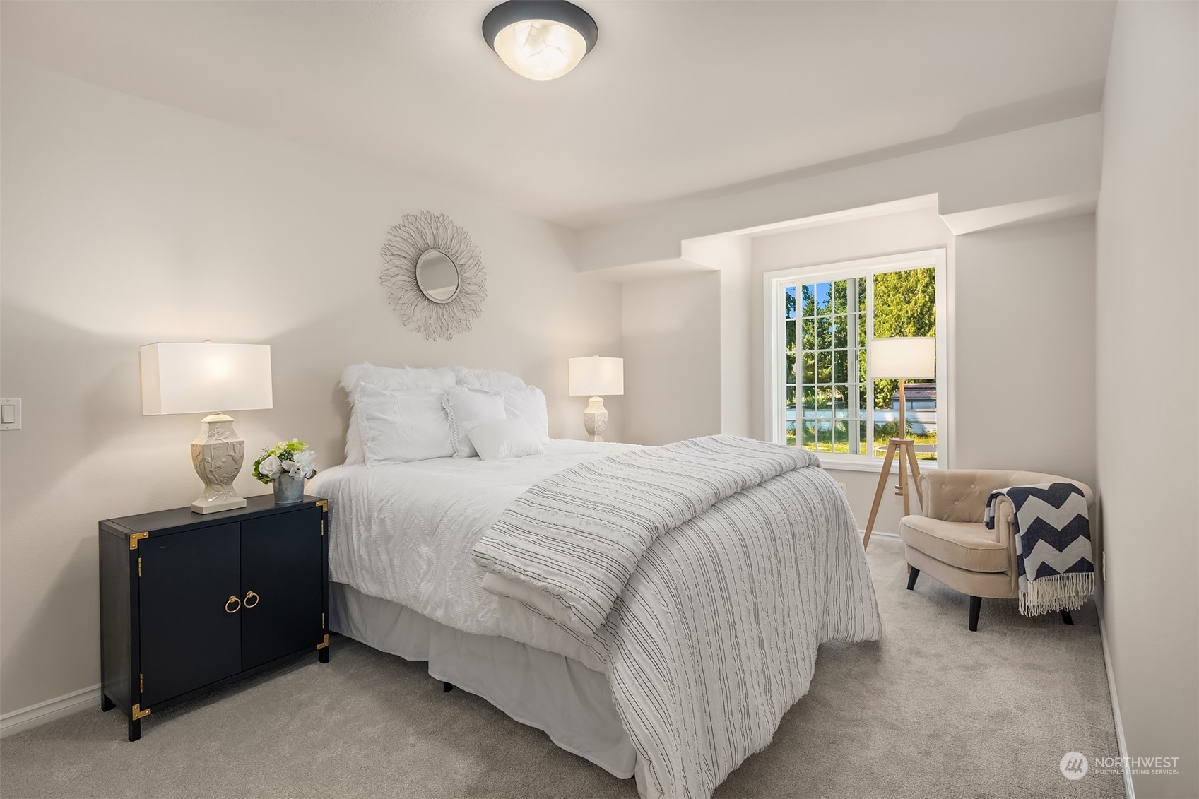 21104 39th Avenue Southeast Bothell, WA 98021 - Photo 25 of 36 a bedroom with bed and window