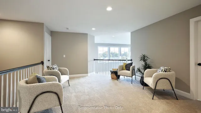 a living room with furniture and window
