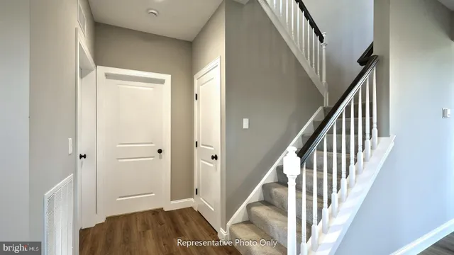 a view of an entryway with staircase