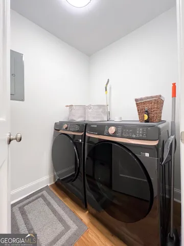 a utility room with washer and dryer