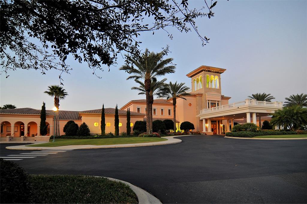 7717 US Open Loop Lakewood Ranch, FL 34202 - Photo 61 of 95 a front view of a building with street view