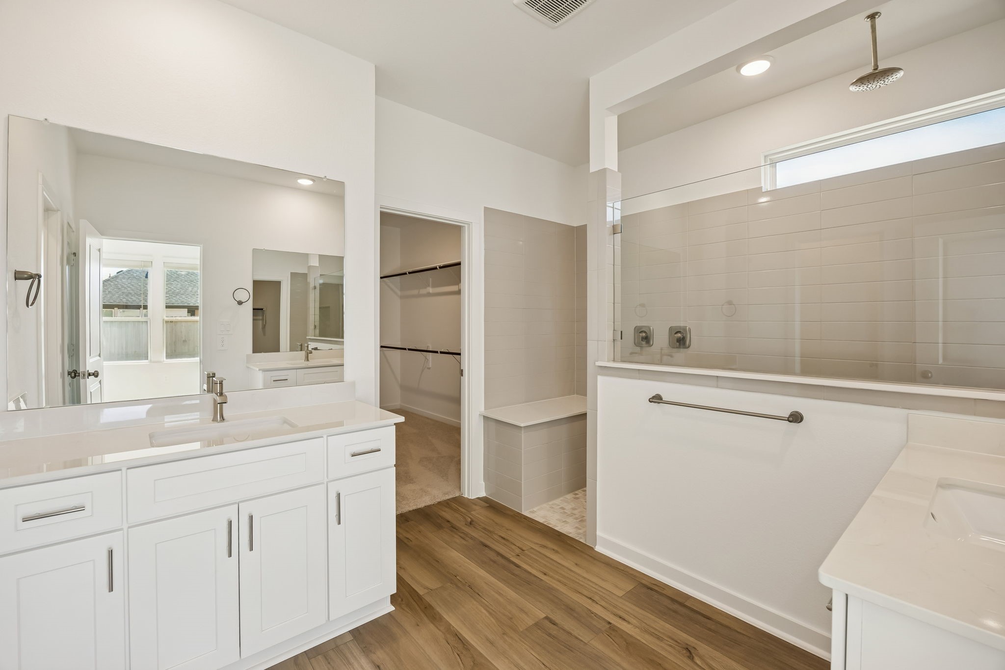 214 Pr Rdg Lane Montgomery, TX 77356 - Photo 11 of 35 a bathroom with a sink a mirror and a shower