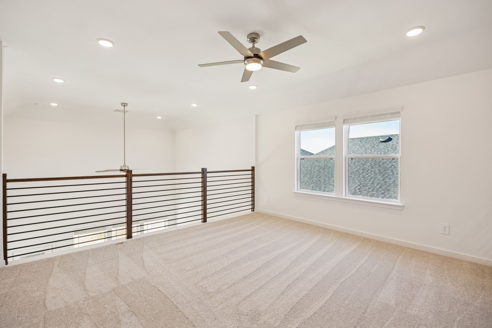 214 Pr Rdg Lane Montgomery, TX 77356 - Photo 18 of 35 a view of a livingroom with a ceiling fan and window