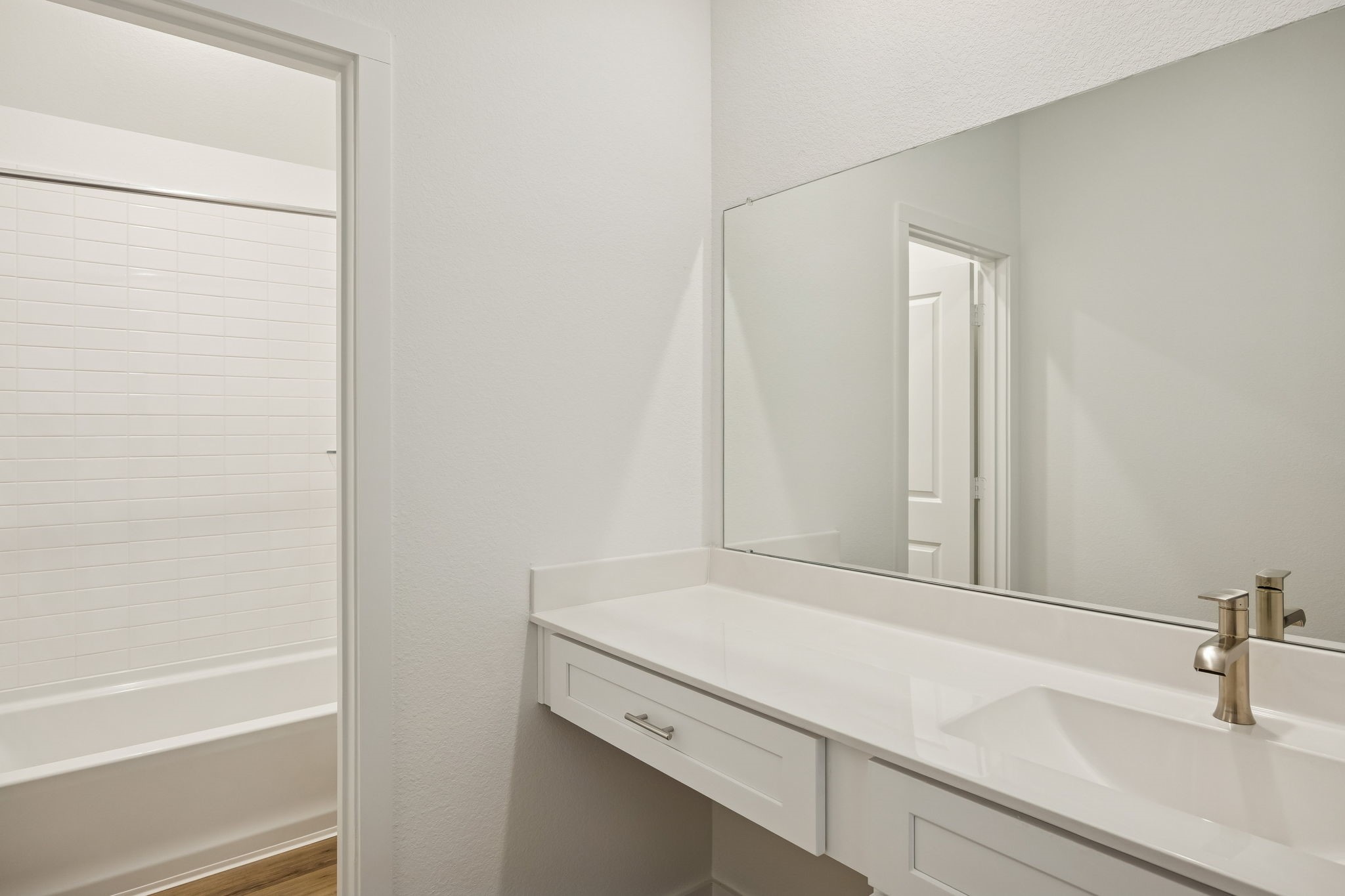 214 Pr Rdg Lane Montgomery, TX 77356 - Photo 24 of 35 a bathroom with a sink and a bathtub