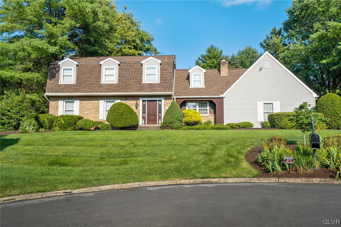2285 Woodbarn Road Lower Macungie Township, PA 18062 - Photo 1 of 45 a front view of house with yard and green space