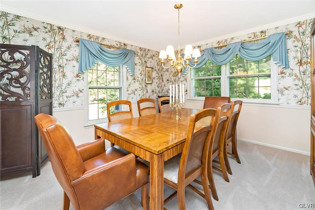 2285 Woodbarn Road Lower Macungie Township, PA 18062 - Photo 16 of 45 a view of a dining room with furniture window and outside view