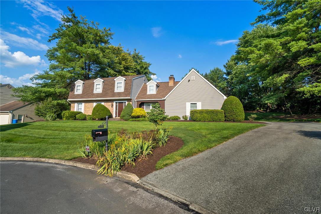 2285 Woodbarn Road Lower Macungie Township, PA 18062 - Photo 2 of 45 a front view of house with yard and green space