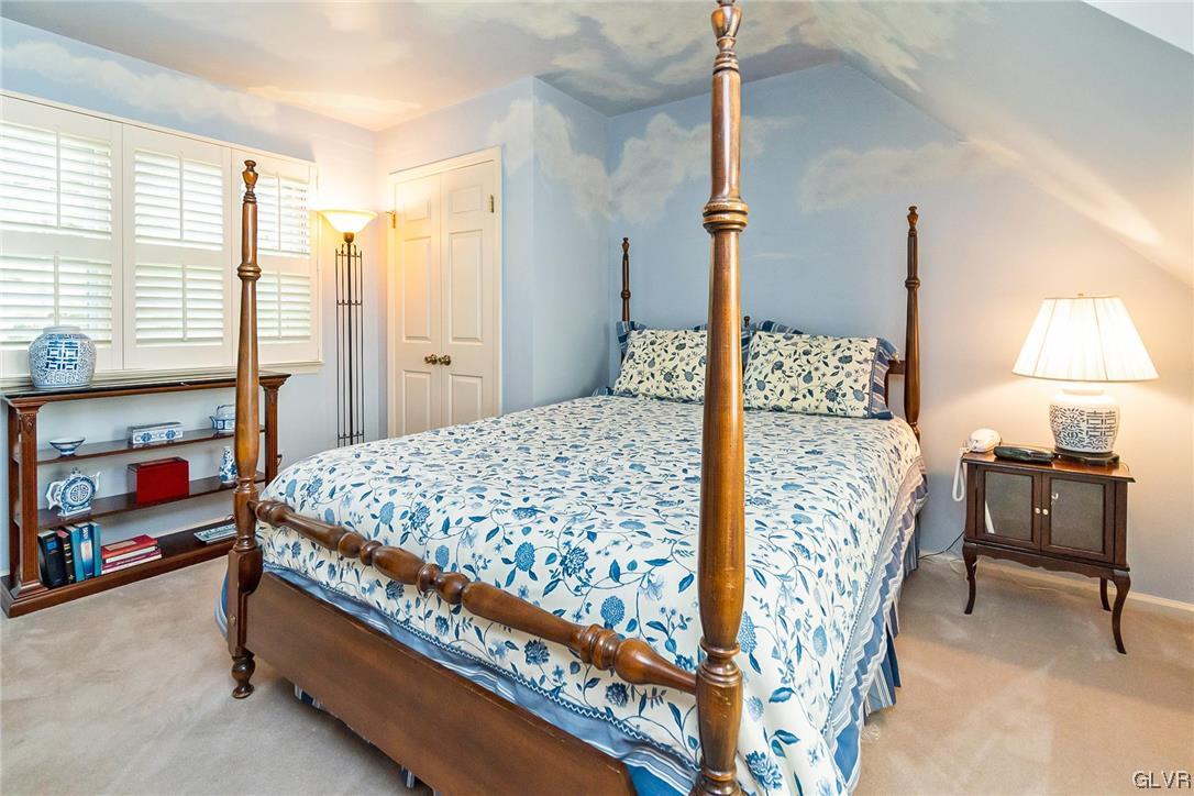 2285 Woodbarn Road Lower Macungie Township, PA 18062 - Photo 28 of 45 a bed sitting in a bedroom next to a window