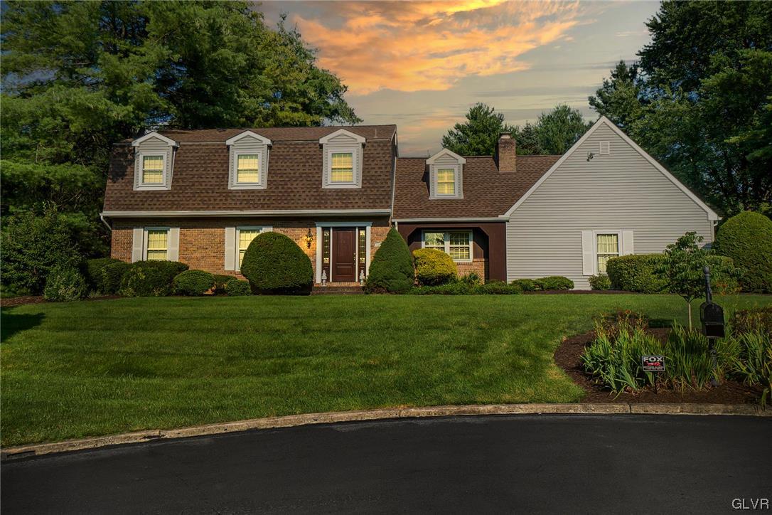 2285 Woodbarn Road Lower Macungie Township, PA 18062 - Photo 3 of 45 a front view of a house with a yard